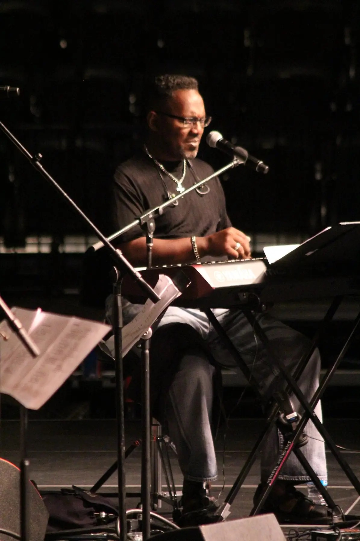 Dr. Tyrone Williams leading worship from the keyboard